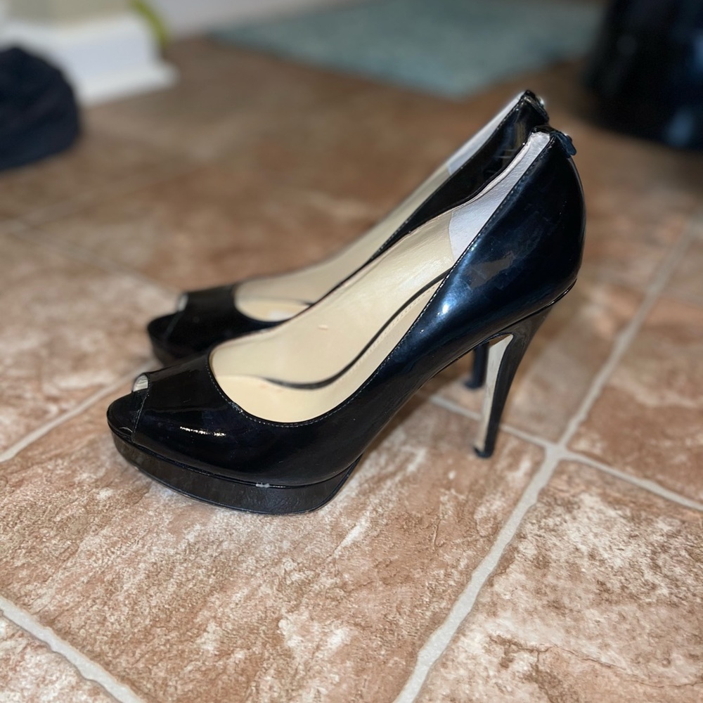 Women’s size 7 Michael kors peep toe pumps
